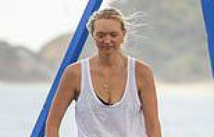 Gemma Ward shows off her trim figure as she and partner take their children to ...