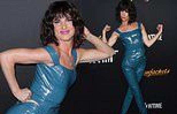 Juliette Lewis puts on a VERY animated display in a blue PVC crop top