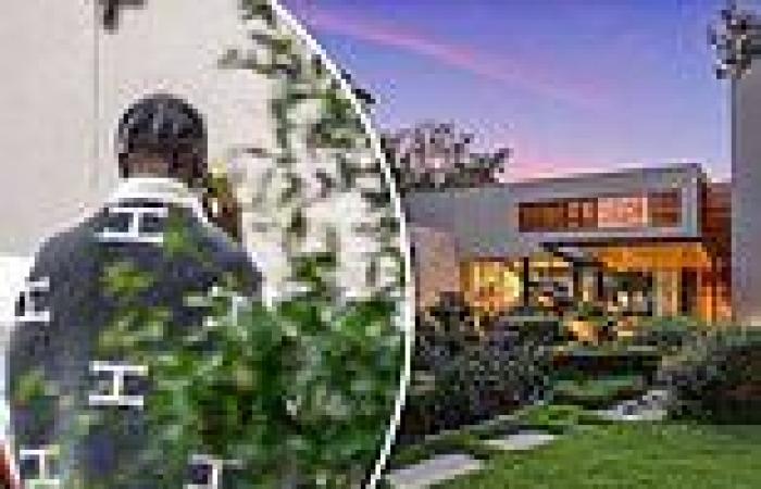 Travis Scott is seen pacing outside his $14million Houston mansion