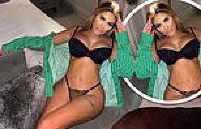 Chloe Ferry flaunts her jaw-dropping figure as she slips into a black bra and ...