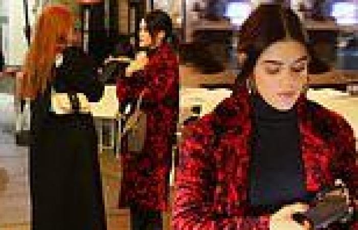 Lucy Hale dons dramatic red coat for NYC dinner with Madelaine Petsch as new ...