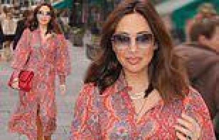 Myleene Klass dons a psychedelic red maxi dress as she makes a stylish arrival ...