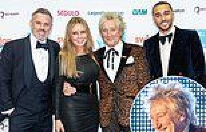 Sir Rod Stewart, 76, dons a leopard print blazer as he performs at Football For ...