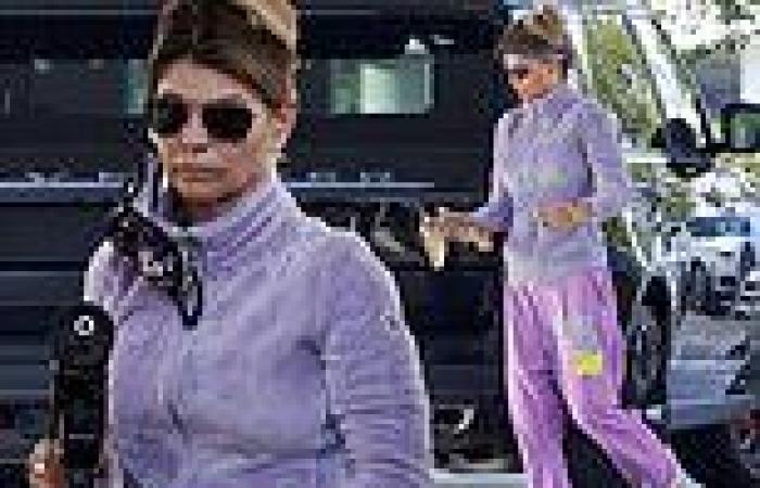 Lori Loughlin goes casual in a lavender tracksuit for a gas station pit stop