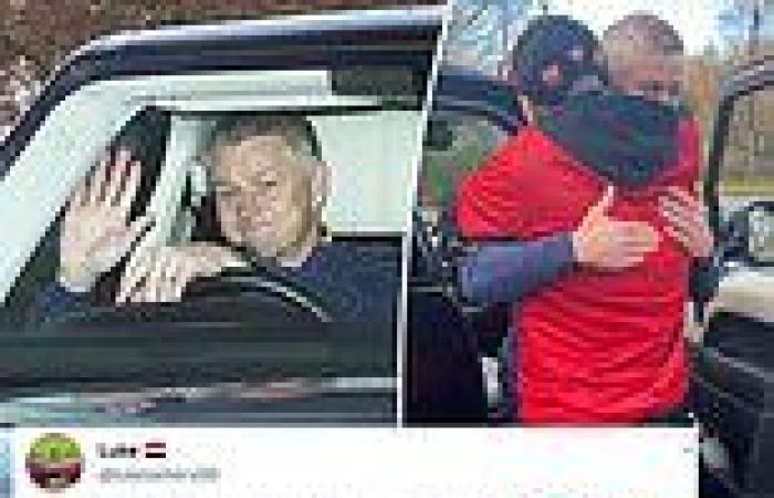 sport news Ole Gunnar Solskjaer hugs Manchester United fan waiting outside Carrington as ...