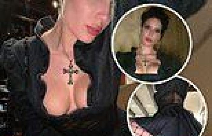 Halsey showcases her cleavage in a sexy Goth-inspired ensemble as she attends ...