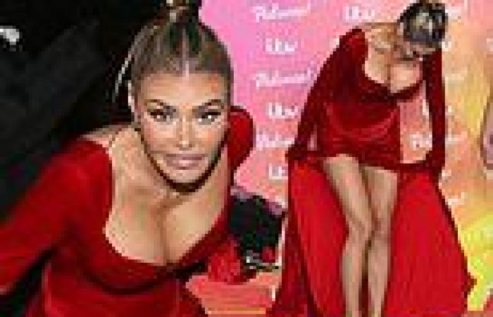 Chloe Sims plays it cool as her dress keeps getting caught on her shoe at ITV ...