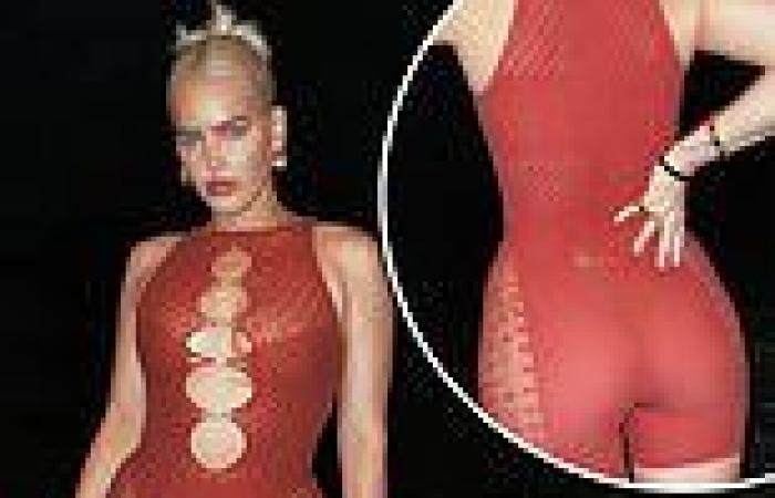 Anne-Marie goes braless and exhibits her toned curves in mesh leotard