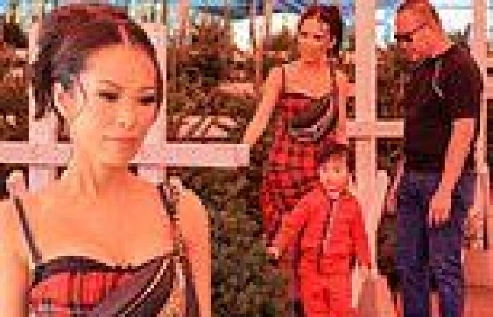 Bling Empire's Christine Chiu leggy in red plaid dress while Christmas tree ...