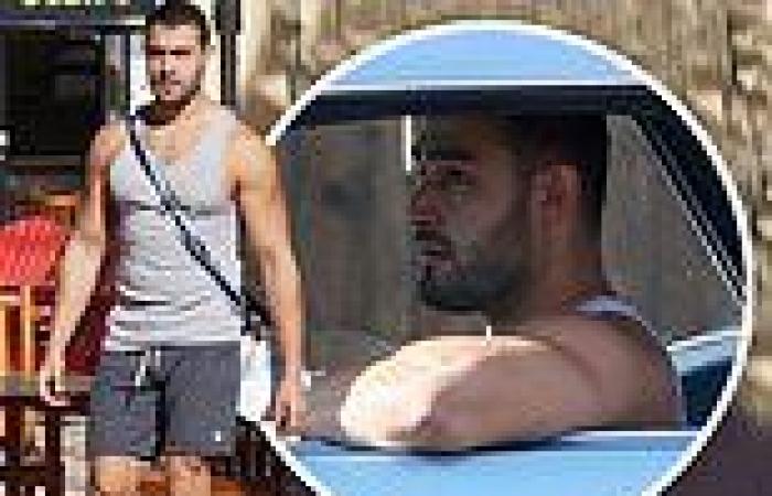Sam Asghari shows off his impressive physique while going for a pre-workout ...