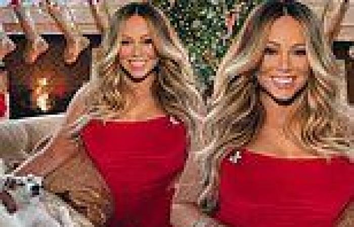 'Queen of Christmas' Mariah Carey rings in the holiday season by her fireplace