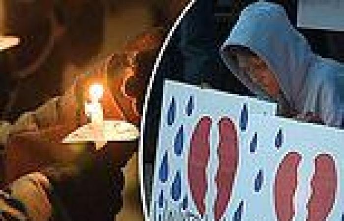 Waukesha residents hold vigil and a moment of silence remember victims week ...