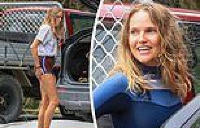 Simon Baker's ex Laura May Gibbs goes for a surf in Byron Bay after splitting ...