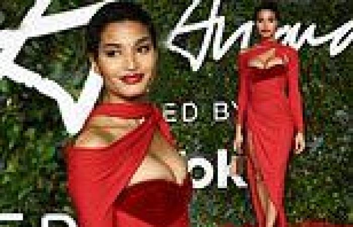 Indya Moore displays their cleavage in a busty red evening dress at the 2021 ...