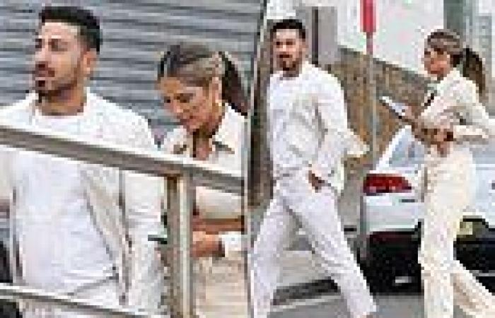 Jono Castano and wife Amy wear coordinating all-white outfits during date night