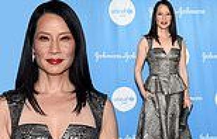 Lucy Liu stuns in a metallic peplum evening gown at the UNICEF at 75 ...