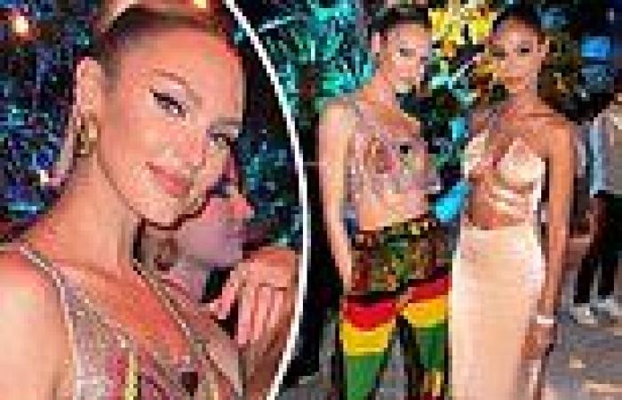 Candice Swanepoel wows in a string bikini top and patterned pants for Tropic Of ...