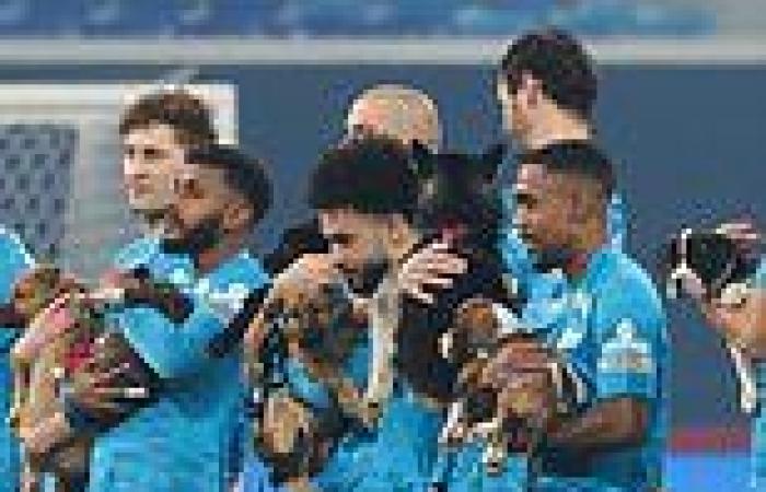 sport news Zenit St Petersburg's players carry out puppies in an adorable display before a ...