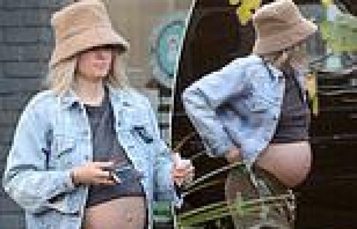 Jessica Hart lets it all hang out as she shows off her baby bump in LA