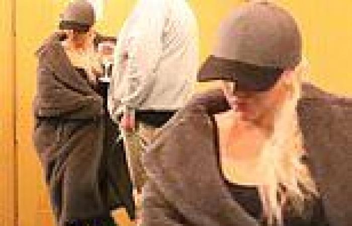 Christina Aguilera puts comfort first in VERY comfortable robe-like coat 