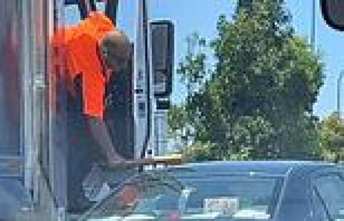 Angry truck driver bashes car's window with baseball bat during shocking road ...