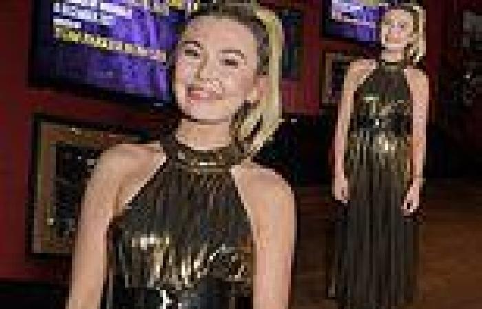 Georgia Toffolo commands attention in a gold halter neck dress at Cigar Smoker ...