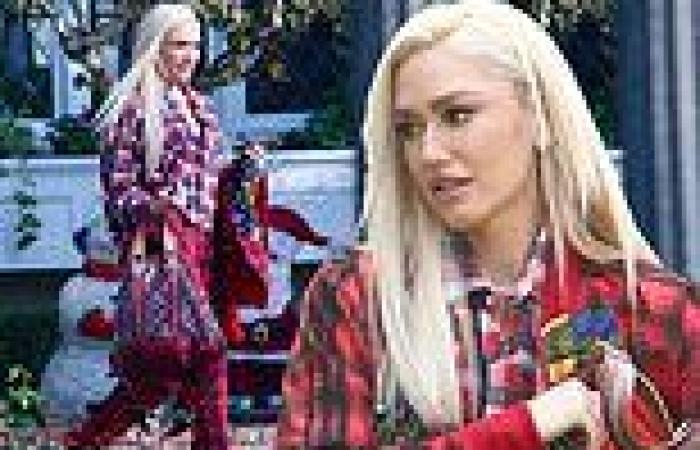 Gwen Stefani certainly seems in holiday spirit as she rocks red and black ...