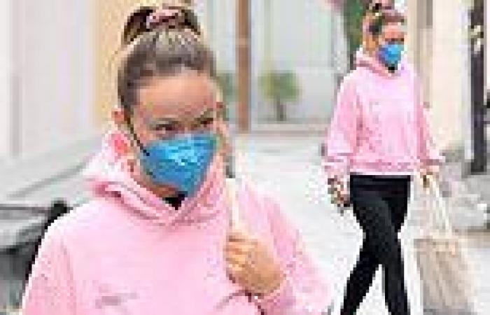 Olivia Wilde sports a pink sweatshirt as she heads to a workout session in Los ...