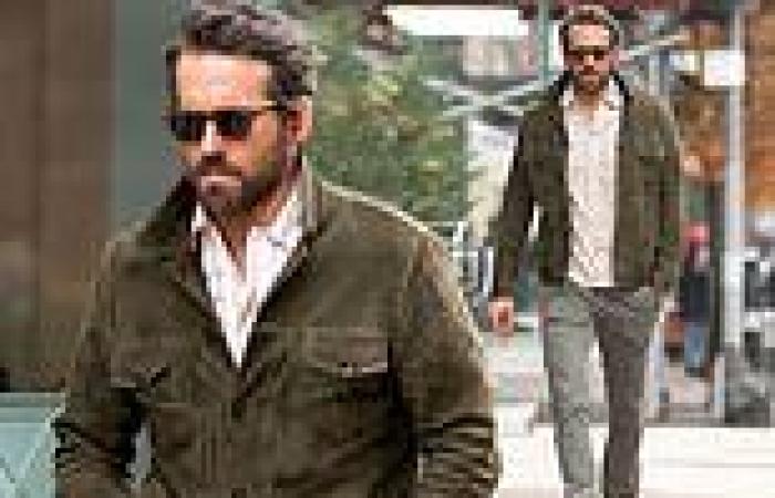 Ryan Reynolds cuts a stylish figure as he steps out in a suede green jacket and ...