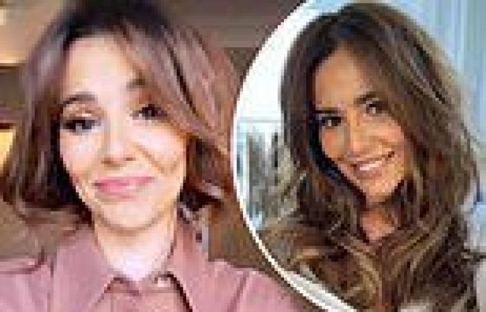 Cheryl shows off chic new curly updo as she experiments with her hair during ...