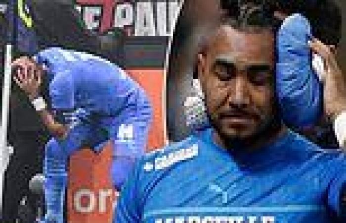 sport news Lyon are DOCKED a point after Marseille's Dimitri Payet was hit by a bottle