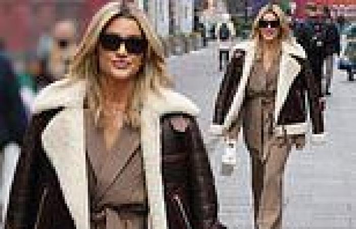 Ashley Roberts braves the autumnal chill in a chic taupe jumpsuit