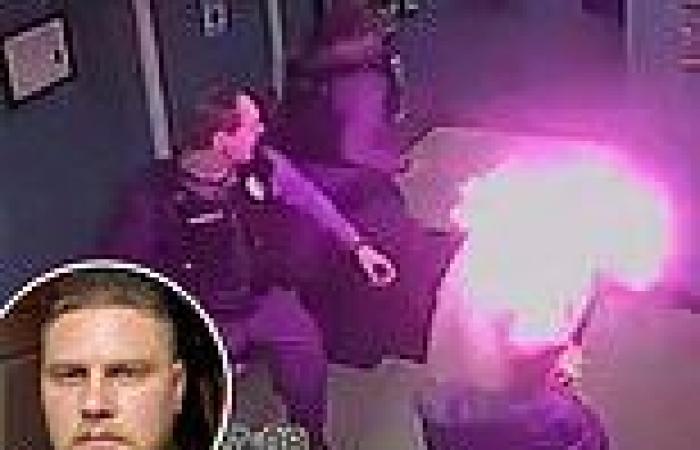 Moment man bursts into flames when cops tasered him after he doused himself ...