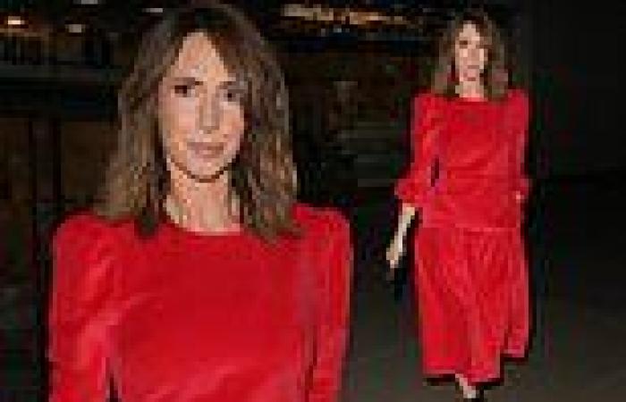 Alex Jones catches the eye in a striking red dress as she steps out after ...