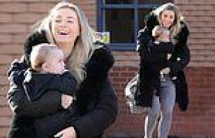 Dani Dyer bundles up in padded coat as she takes her adorable son Santiago out ...
