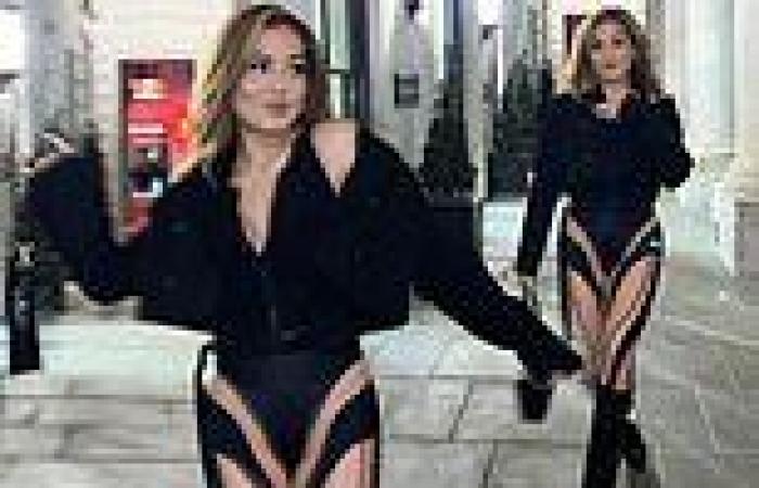 Mabel oozes confidence in a revealing lycra leotard and knee high boots