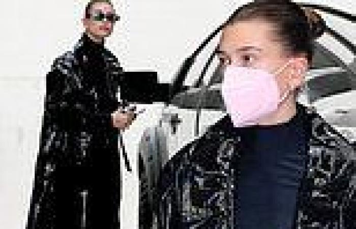 Hailey Bieber rocks a black Matrix-inspired coat at a meeting in Beverly Hills