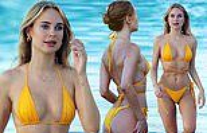 Kimberley Garner flaunts her jaw-dropping figure in a TINY bikini
