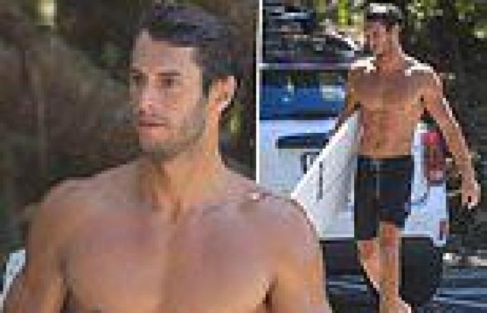 Love Island star Elias Chigros shows off his muscular frame as he goes surfing ...