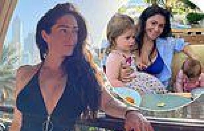 Casey Batchelor shows off her incredible figure in a black bikini during ...