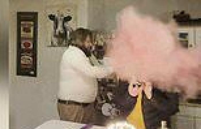 Wife is covered with pink powder when confetti cannon surprise goes wrong in ...