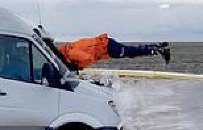 Russian stuntman flies through Mercedes minibus going 50mph