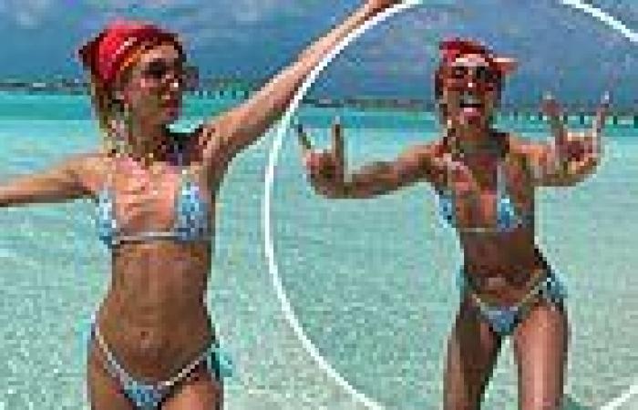 Megan McKenna shows off her toned physique in blue string bikini as she larks ...