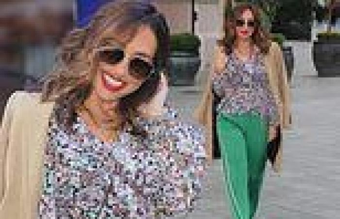 Myleene Klass cuts a casual figure in floral blouse and green tracksuit bottoms ...