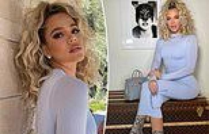 Khloe Kardashian is a 'Material Girl' in clinging blue dress as she poses on ...