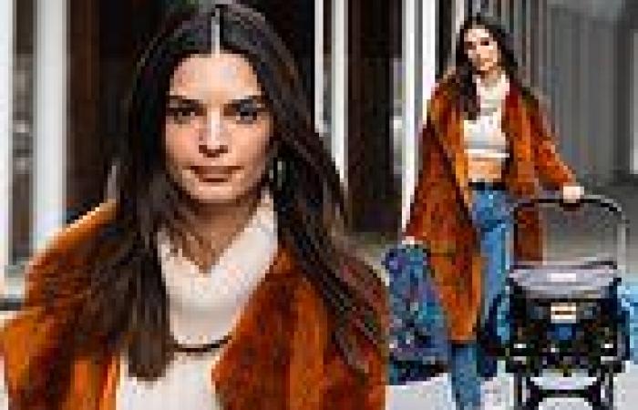 Emily Ratajkowski is cozy in a fuzzy orange coat as she steps out for lunch at ...