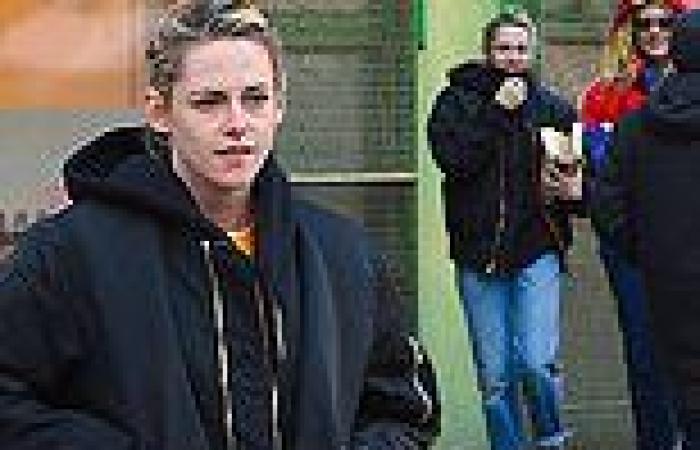 Kristen Stewart bundles up in a black hoodie and bomber jacket as she steps out ...