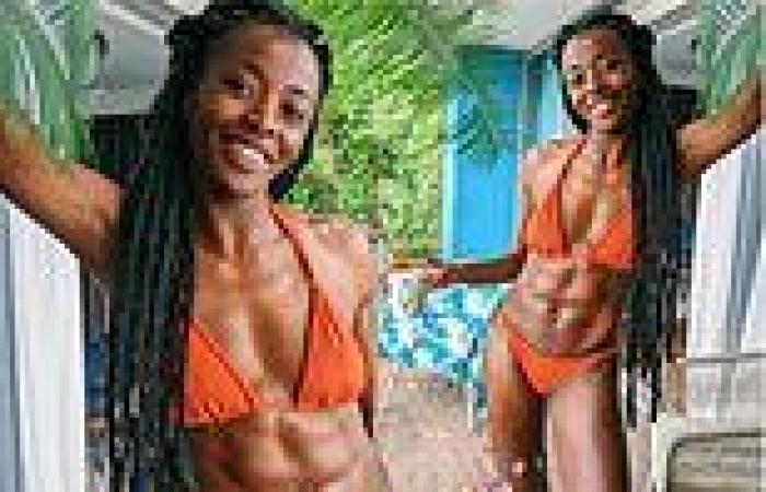 AJ Odudu flaunts her VERY toned abs as she says she is being 'eaten by ...