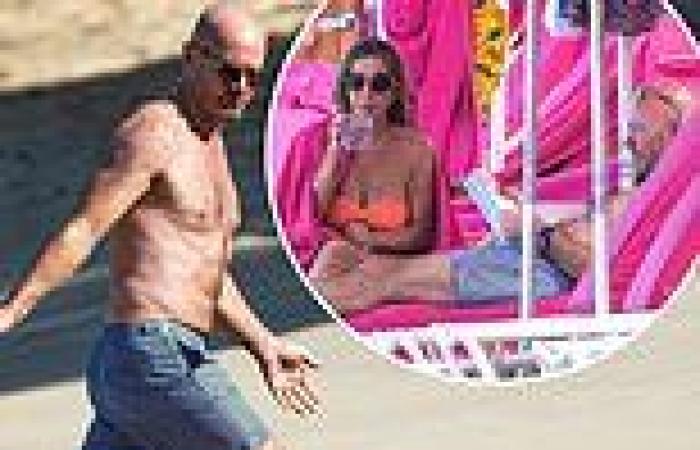 Alan Shearer goes shirtless for day at the beach with his wife Lainya in ...