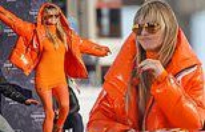 Heidi Klum rocks all orange on set of Germany's Next Top Model in California